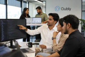 "Professional software development team collaborating on custom web application project in modern Pakistan office environment"